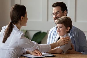 father and son with a child custody evaluator