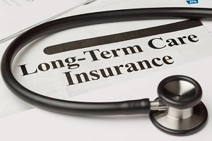 long term care insurance written on paper under sthethoscope