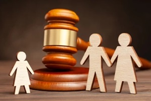 concept of child custody with court gavel in the background