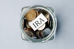 ira concept with coins in the jar